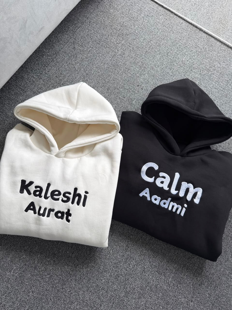 Kaleshi Aurat Calm Aadmi Embroidery Hoodies - (Set Of 2)